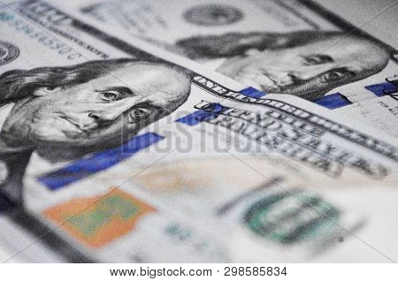 Close Up Hundred Dollar Baknotes With Portrait Of Benjamin Franklin.