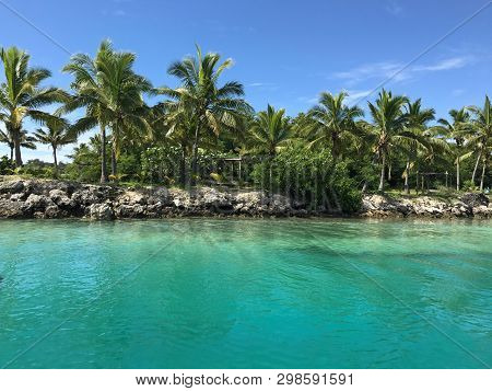 Matamanoa Island In Fiji With Turquoise Blue Waters