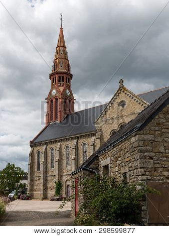 The Church In Saint-lyphard (france) On A Cloudy Day In Summer