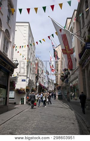A High Street In The Town Of St Pierre Port (st Peter Port), The Main Settlement Of Guernsey, The Ch
