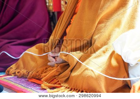 Holy Thread In Monk Hands