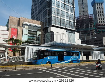 Jakarta, Indonesia - April 17, 2019: Transjakarta Bus Getting Some Passengers At Bundaran Hi Bus She