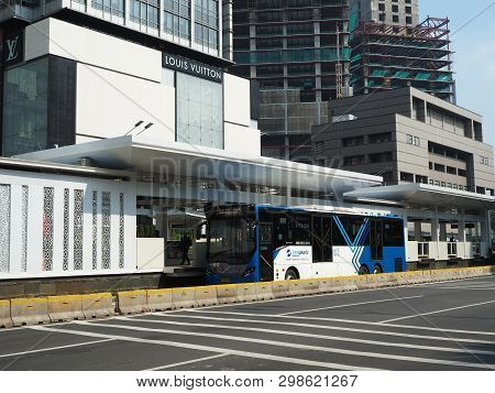 Jakarta, Indonesia - April 17, 2019: Transjakarta Bus Getting Some Passengers At Bundaran Hi Bus She