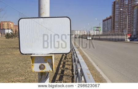 The Power Button Traffic Lights At The Crosswalk With A Blank Sign. On An Empty Sign Can Be Applied 