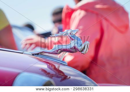 Samara, Russia - August 18, 2018: Figure-emblem Deer On The Hood Of A Retro Car Volga Gas-21