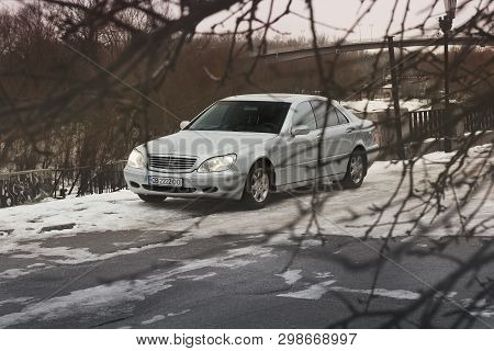 Kiev, Ukraine - November 22, 2018: Mercedes-benz S-class In Winter Among Tree Branches. Abstract Pho