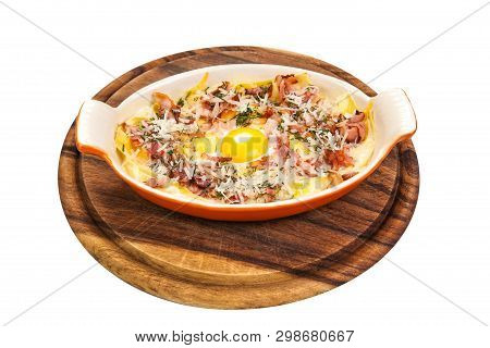 Breakfast. Scrambled Eggs With Bacon, Meat, Grated Parmesan Cheese, In Ceramic Ware, On A Wooden Sta