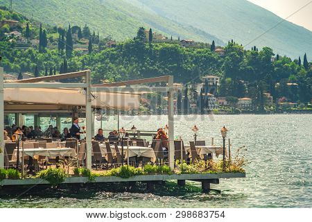 People Lunch In An Elegant Floating Restaurant On The Lake Garda Waters In Malcesine, Italy, 22 Apr 