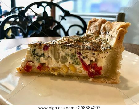 Quiche Tart Kis / Vegetable Pie Slice Served With Plate At Restaurant.