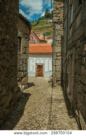 Narrow Cobblestone Alley And Old Houses With Stone Wall, In A Sunny Day At Alvoco Da Serra. A Cute V
