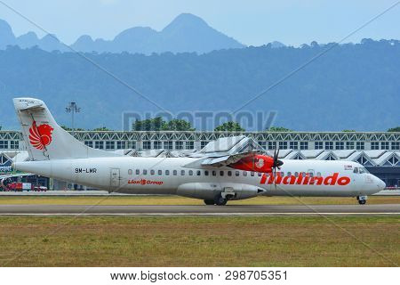 Airplane Taxiing On Runway