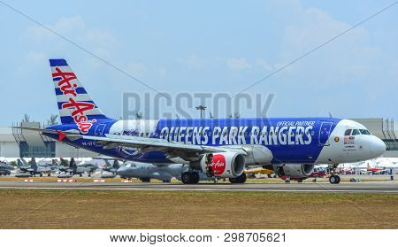 Langkawi, Malaysia - Mar 30, 2019. An Airbus A320 Airplane Of Airasia (9m-afv Queens Park Rangers) T