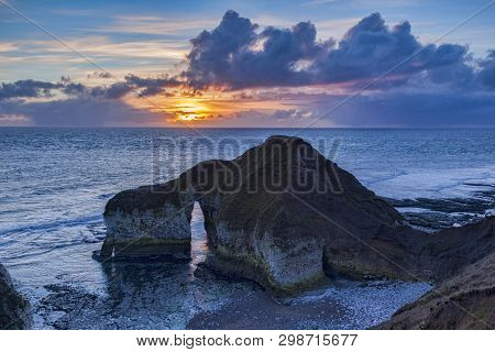 Limestone Rock Formation Known As The Dinosaur, Flamborough Head, East Yorkshire, England, Uk, Sunri