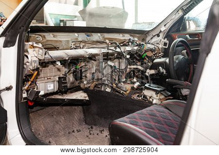 A Large Tangle Of Ravel Multicolored Wires From The Car Wiring Lies In The Cabin Of Dismantled Car W