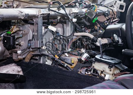 A Large Tangle Of Ravel Multicolored Wires From The Car Wiring Lies In The Cabin Of Dismantled Car W