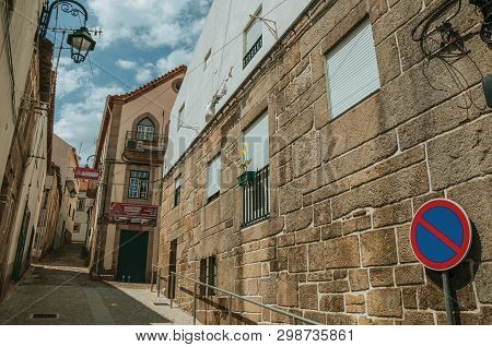 Gouveia, Portugal - July 17, 2018. Charming Old House With Stone Wall On Alley And No Parking Road S
