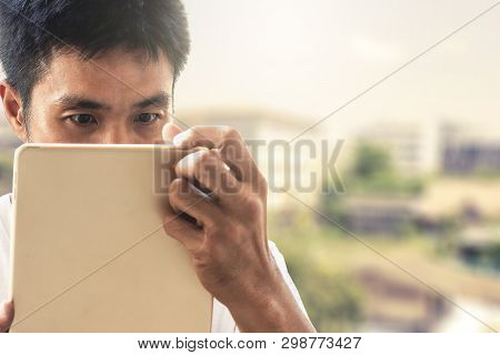 Man Holding Tablet For Blurred Bokeh Background E-shopping Marketing Digital, Consumer Purchase Shop