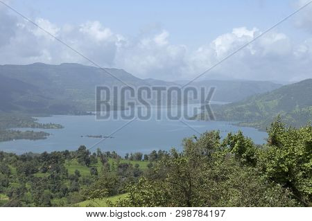 Mountains And River Water Landscape With Clouds At Satara, Maharashtra, India.