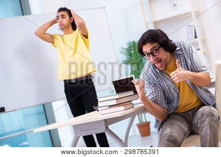 Two male students in the classroom
