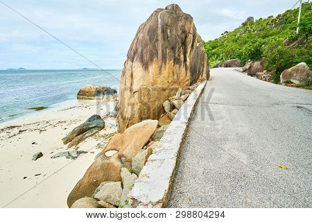Beautiful Road Of Praslin With View Of Tropical Beach With Big G