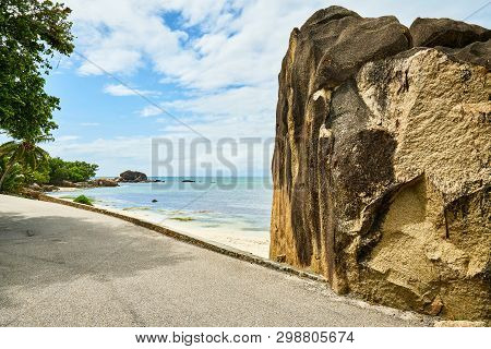 Beautiful Road Of Praslin With View Of Tropical Beach With Big G