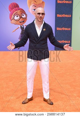 LOS ANGELES - APR 27:  Pitbull aka Armando Christian Perez arrives for the 'Ugly Dolls' World Premiere on April 27, 2019 in Los Angeles, CA                