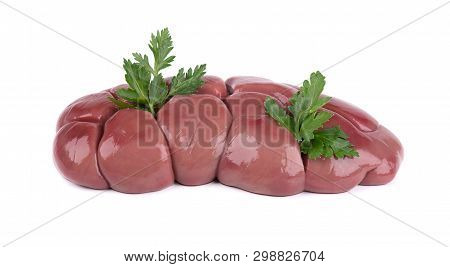 Beef Kidney Raw Isolated On White Background. Close Up. Cow Kidney Isolated With Parsley Leaves.