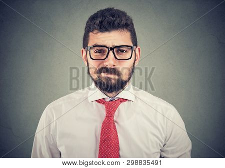 Skeptical Doubtful Business Man Looking At Camera