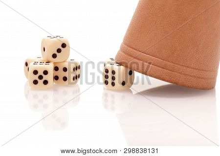 Dices And A Gmaing Shaker Isolated On White Background. Gaming, Luck And Risk Concept.