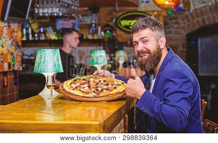 Hipster Hungry Eat Italian Pizza. Hipster Client Sit At Bar Counter. Man Received Delicious Pizza. E