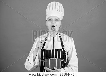 Woman Professional Chef Hold Whisk And Pot. Whipping Like Pro. Girl In Apron Whipping Eggs Or Cream.