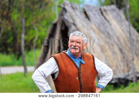 Petrikovka, Dnepropetrovsk Region, 28 04 2019. An Elderly Man In The Ukrainian Costume Smiles At The