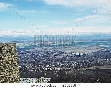 Top View Of Alazani Valley In Georgia In Springtime, In The Distance Through The Haze Visible To The