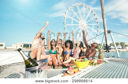 Multiracial Friends Having Fun With Wine And Fruit Brunch At Sail Boat Party - Friendship Concept Wi