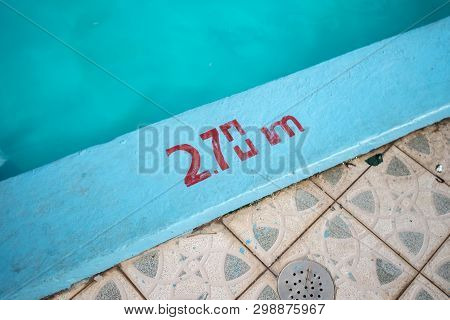 Swimming Pool With 2.70m Depth Marker Painted In Red