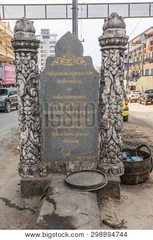 Sihanoukville, Cambodia - March 15, 2019: Gray Stone Buddhist Religious Shrine On Center Divider Of 