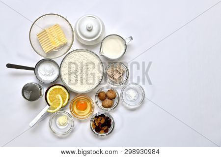 Ingredients For Yeast Dough And Sugar Glaze. Each In A Separate Container: Flour, Butter, Egg, Sugar
