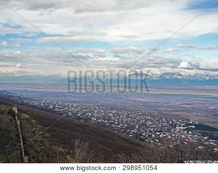 Top View Of Alazani Valley In Georgia In Springtime, In The Distance Through The Haze Visible To The