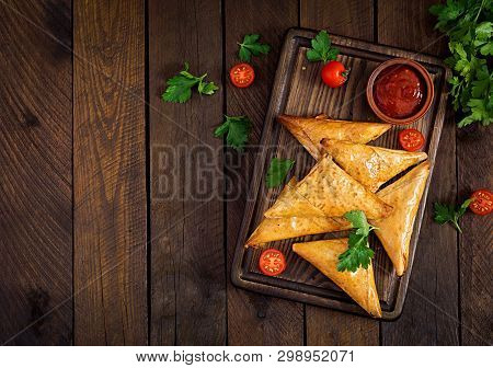 Asian Food. Samsa (samosas) With Chicken Fillet And Cheese On Wooden Background. Top View