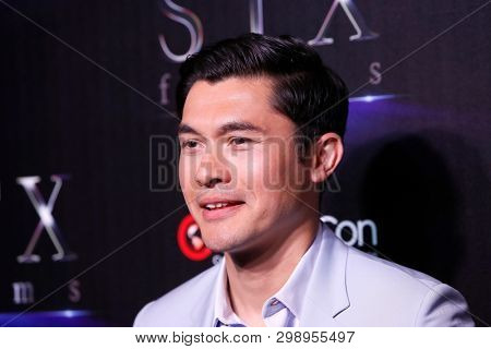 LAS VEGAS - APR 2:  Henry Golding at the 2019 CinemaCon - STX films at Caesars Palace on April 2, 2019 in Las Vegas, NV