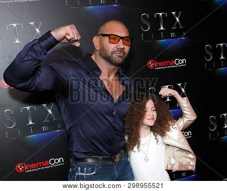 LAS VEGAS - APR 2:  Dave Bautista, Chloe Coleman at the 2019 CinemaCon - STX films at Caesars Palace on April 2, 2019 in Las Vegas, NV