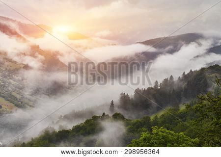 Summer Mountain Panorama. Small Wooden House Cottage And Barn On Green Mountain Valley On Bright Fog