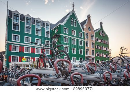 Zaandam, The Netherlands, April 18, 2019: Bicycle Parking At Zaandam Station With In The Background 