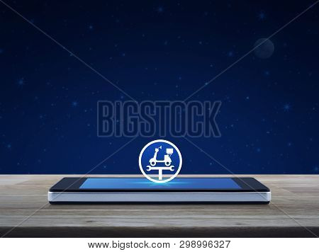 Service Fix Motorcycle With Wrench Tool Flat Icon On Modern Smart Mobile Phone Screen On Wooden Tabl