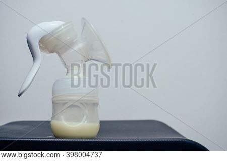 Manual Breast Pump, Mothers Breast Milk Giving Healthy Food For Newborn Baby