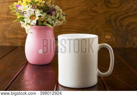 White Coffee Mug Mockup With Field Flowers. Empty Mug Mockup For Product Presentation. Coffee Cup Mo