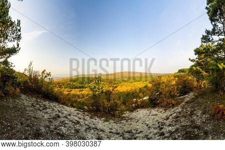 Mountains And Forests Of Crimea. Coniferous And Deciduous Trees On The Hills Of The Mountains And Ro