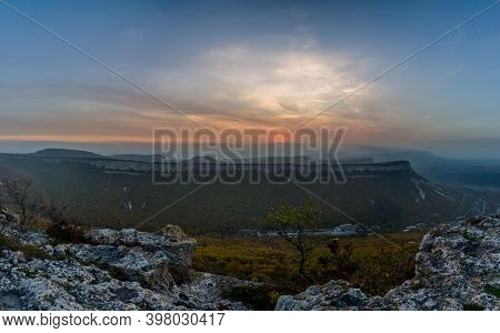 Mountains And Forests Of Crimea. Coniferous And Deciduous Trees On The Hills Of The Mountains And Ro