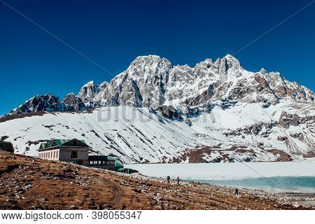 Amazing Blue Gokio Lake Under Ice And Snow, Nepal, Himalayas
