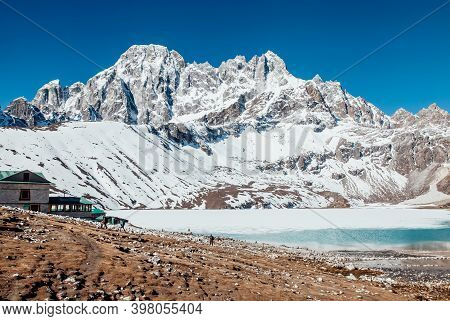 Amazing Blue Gokio Lake Under Ice And Snow, Nepal, Himalayas